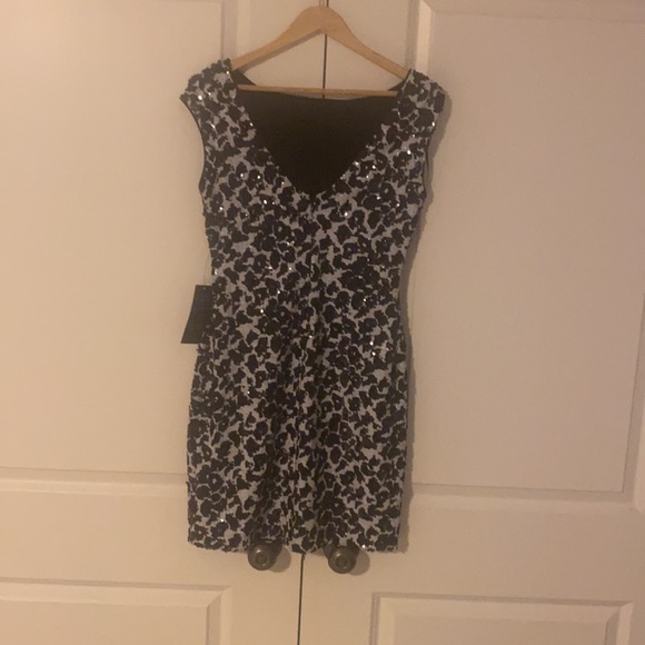 Brand new Guess dress, black and white sequence. Prefect for the Holidays - Picture 2 of 3